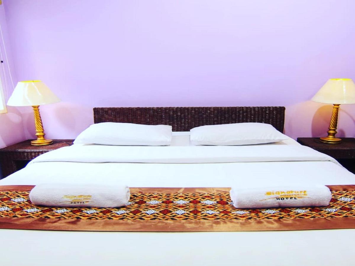 Hotel Signature Mandala Kencana 展玉 外观 照片